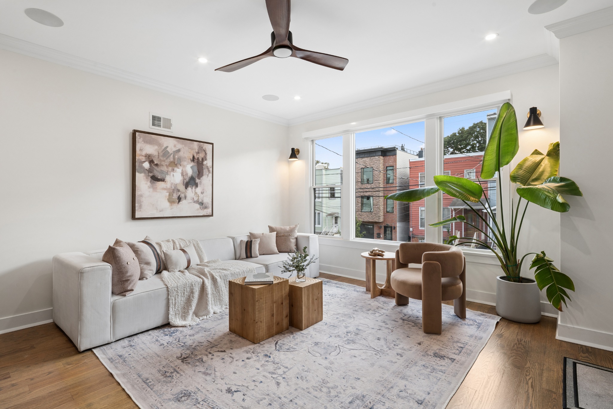 Modern duplex home at 204 Bowers Street in Jersey City Heights with attached garage and landscaped front entrance.